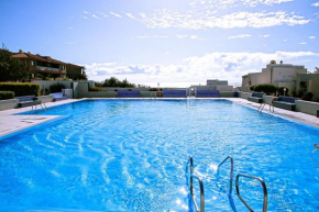 Inviting 1-Bed Apartment in Poris with 3 Pools
